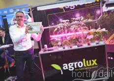 Dennis Dullema with Agrolux showing his award for Best Booth in the Technology category!
