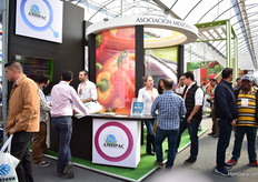 The team of AMHPAC talking with visitors.