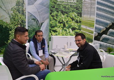 Doing business at the booth of Ginegar.