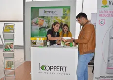 Giving information at the booth of Koppert in the Greenhouse.