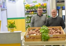 Markus Falkenbach & Marco Luhrs with Volmary showing their sweet potato. 