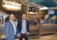 Leo van der Ven and Patrick ten Have of Koppert Machines. Behind them is the multipacker that is suitable for packaging various snack vegetables. The machines de-nest, weigh and lid and can be used for both plastic and cardboard.