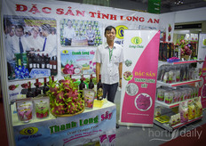 Phan Nguyen Ngoc with Dac San Tin shows the dried dragon fruit. 