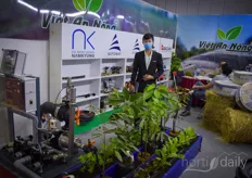Viet An Nong’s team member Le Su Huon shows hydroponic and irrigation solutions.