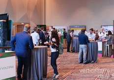 A busy drinks reception on the first day