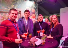 Dmitri Dodica, Marius Ganea, Anatolie Buruiana & Irina Pompus of Chemonics International toast to a successful day at Mechatronix.