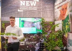 Simon Madsob Jensen with Ellepot holding the company's newest hydroponic sleeve system