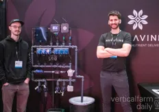 Miles Dubois and Alex Babich with Nuravine standing next to their batch dosing system, an upcoming central dosing system to control indoor farm fertigation needs
